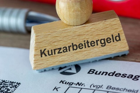 Symbolic image of short-time working allowance: Close-up of a stamp on a form from the Federal