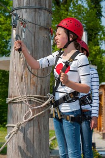 Young girl in climbing park, climbing, action, safety, belay, belay rope, belay technique, belay