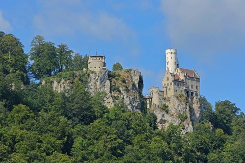 Castle built 19th century on mountain with rocks, forest, landscape, Honau, Lichtenstein, Albtrauf,