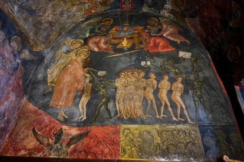 Painted religious picture in an Orthodox church with numerous figures and spiritual themes, scenes