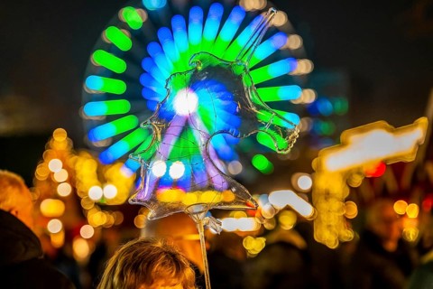 Transparent unicorn-shaped balloon, Christmas market on Königsstraße in the city centre of