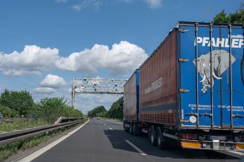 Truck passes through a toll check on the motorway, Bavaria, Germany, Europe