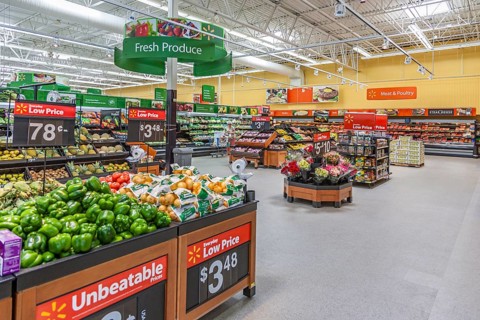Produce department displays fruits and vegetables at Walmart shopping center in Biloxi,