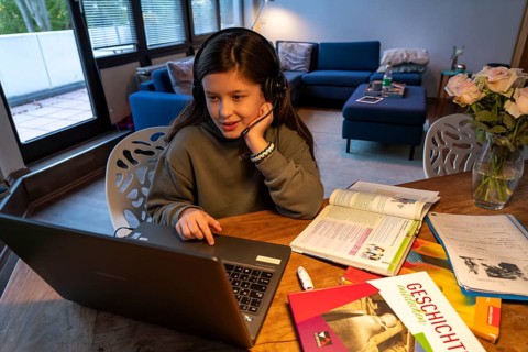 Homeschooling, girl, 11 years old, learns at home, home learning, lessons at home, distance
