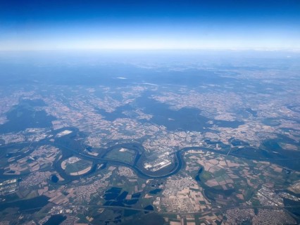 Aerial view from a great height View of the winding Old Rhine and the Rhine straightened for river