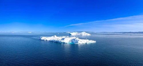Iceberg seen from cruise ship vacation in Greenland coast in Arctic circle near Ilulissat Disko Bay
