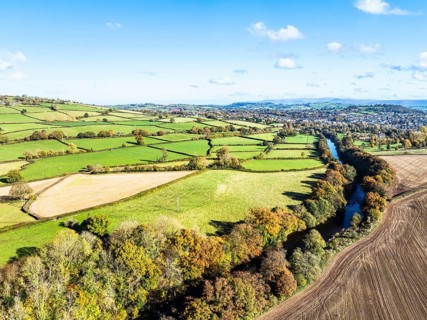 Fields and Farms over River Usk from a drone, Brecon, Brecon Beacons, Powys, Wales, England, United