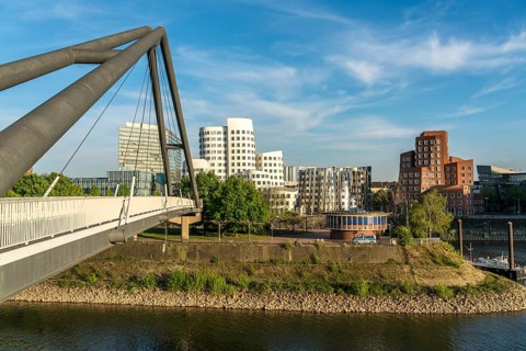Bridge at the Media Harbour and the New Customs Yard with the Gehry buildings by architect and