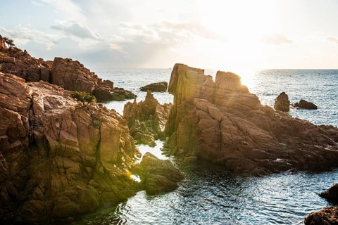 Red rocks and sea, Spiaggia Su Sirboni, sunrise, near Tertenia, Province of Ogliastra, Sardinia,