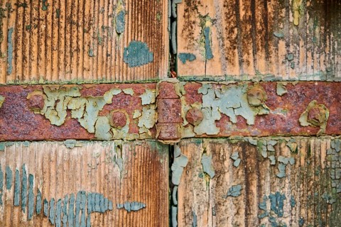 Detail of weathered wood from an old window shutter, Burano, Venice Italy