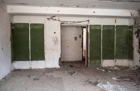 Abandoned, destroyed room in a residential building, Soviet apartment blocks, ghost town,