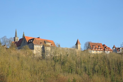 View of Dominican monastery with historic town wall and beggar bailiff's defence tower, town