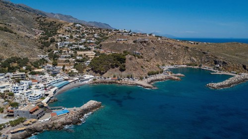 Aerial view of bay with harbour of Chora Sfakion on the south coast of Crete Libyan Sea