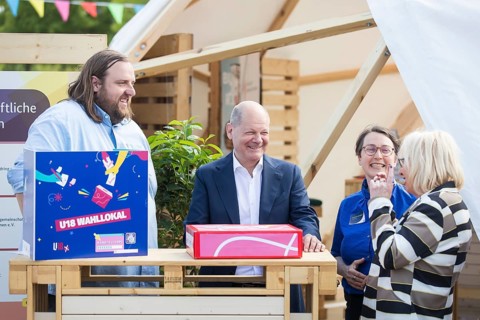 Olaf Scholz (Federal Chancellor, SPD) visits the stand of civil society organisations during a tour
