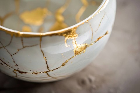 Japanese Kintsugi bowl with ceramic repair technique that uses lacquer mixed with powdered gold. KI