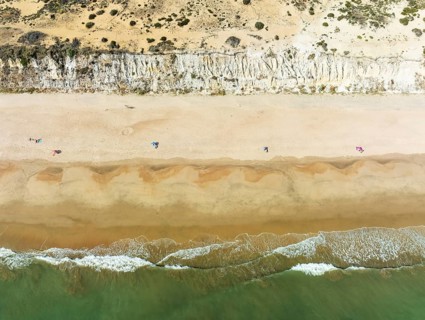 Beach life at the Asperillo cliff, the highest dune cliff in Europe. At the Atlantic Ocean near