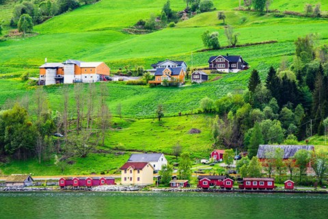 Mountains and Fjord over Norwegian Village, Olden, Innvikfjorden, Norway, Europe