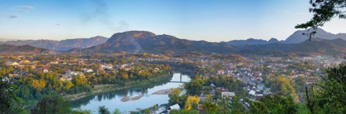 Panorama over Luang Prabang with Nam Khan River and Wat Phol Pao in the background, Laos, Asia