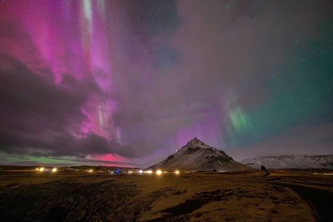Northern lights over mountain in Arnarstapi, Snäfellsnes peninsula, Snæfellsnes, West Iceland,