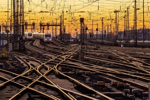Track apron with trains, rails, points, pylons and signalling systems. Infrastructure at the main