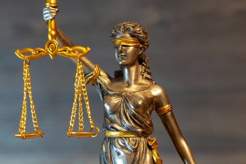 Close-up of a Justitia as a symbol of court judgements, jurisdiction, justice, etc