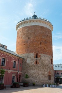 High brick tower in the courtyard of a historic building, watchtower, castle, museum, Lublin,