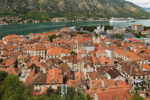 High angle view of apartment buildings and houses covered with traditional terracotta clay roof