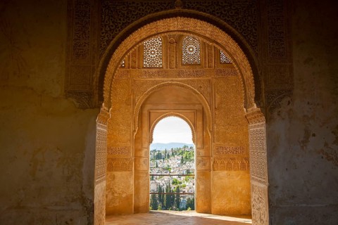 Stone arches in Islamic key shape in the Generalife palace, Alhambra, Granada, Spain, Europe