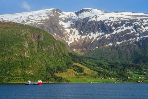 Mountains and Fjord over Norwegian Village, Olden, Innvikfjorden, Norway, Europe
