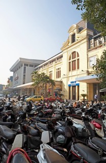 Mopeds at Hanoi railway station, Vietnam, Asia