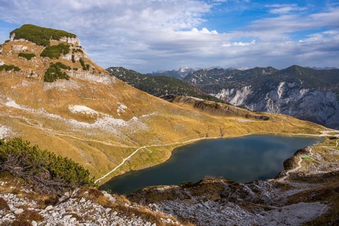 Lake Augstsee and the Atterkogel mountain on the Loser. View of other mountains. Autumn, good