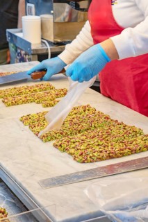 Person making traditional nougat, Ortygia, Syracuse, Sicily, Italy, Europe