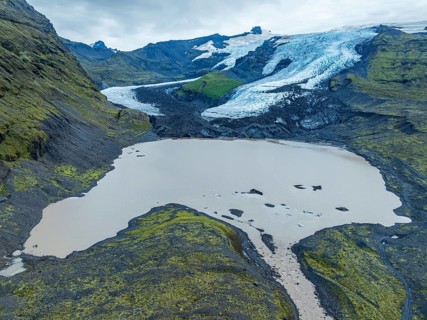 Aerial view of glacier Falljökull, a glacier tongue of Vatnajökull glacier, glacial lake, Iceland,