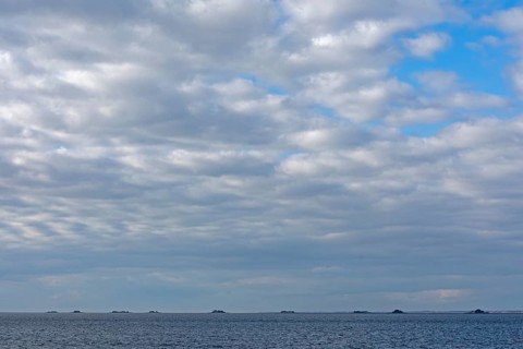 Clouds over Hallig Langeneß, North Frisia, Schleswig-Holstein, Germany, Europe