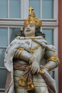 Sculpture of a Roman emperor with golden crown and cross, golden, view, detail, ancient king, Zum