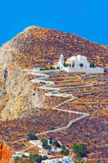 View of Panagia Kimissis church built on a cliff above the sea, Chora, Folegandros Island, Cyclades