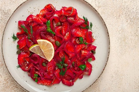 Salmon gravlax with beetroot, Scandinavian snack, beet gravlax, lightly salted fish, homemade, no