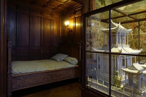 Bed and miniature ivory Chinese pagoda in the Louis XIV room at Kasteel van Gaasbeek, renovated