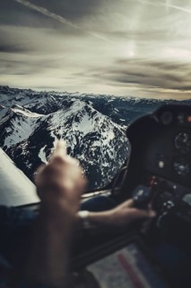 Flight over the late winter Lech Valley with a small aeroplane in Tyrol, Austria, Europe