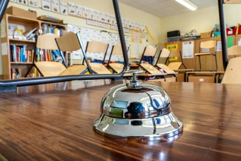 Classroom of a fourth grade, after school, the building is older but in good condition, break bell