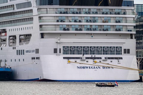 The cruise ship Norwegian Dawn at the Passenger Terminal Amsterdam, Cruise Port Amsterdam, belongs
