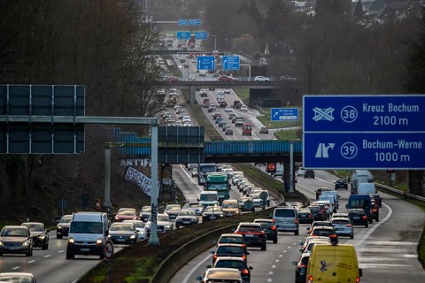 Motorway A40, Ruhrschnellweg, near Bochum, dense evening traffic, in front of the motorway junction