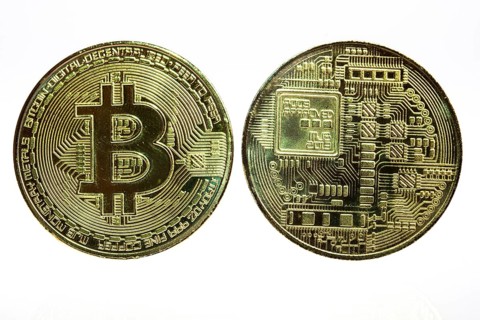 Bitcoin, cryptocurrency, symbol coin, optical placeholder for the digital currency, front and back,