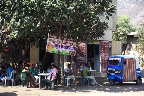 In a village in the highlands between Mekele and Lalibela, locals sitting in a restaurant,
