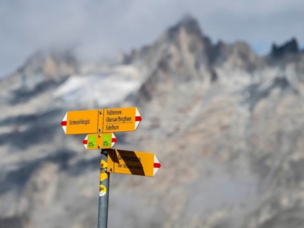 Signposts to Grimsel Hospiz, Lake Oberaar, hiking path, Switzerland, Europe