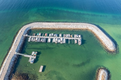 Aerial view of the marina at village Skaland, Senja island, Norway, Europe