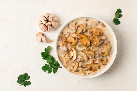 Champignons in creamy garlic sauce, with herbs and spices, gravy, sauce, no people
