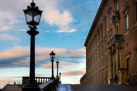 Silhouette of the royal palace in the evening sun, evening mood, guard, royal house, monarchy,