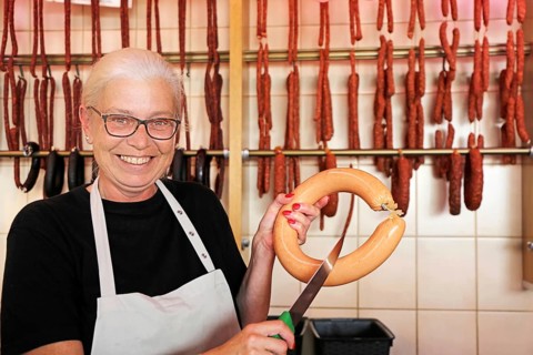 Symbolic image Friendly butcher's shop assistant