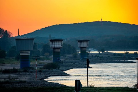 Rhine at Duisburg-Bruckhausen, towers of the water extraction facilities of ThyssenKrupp Steel